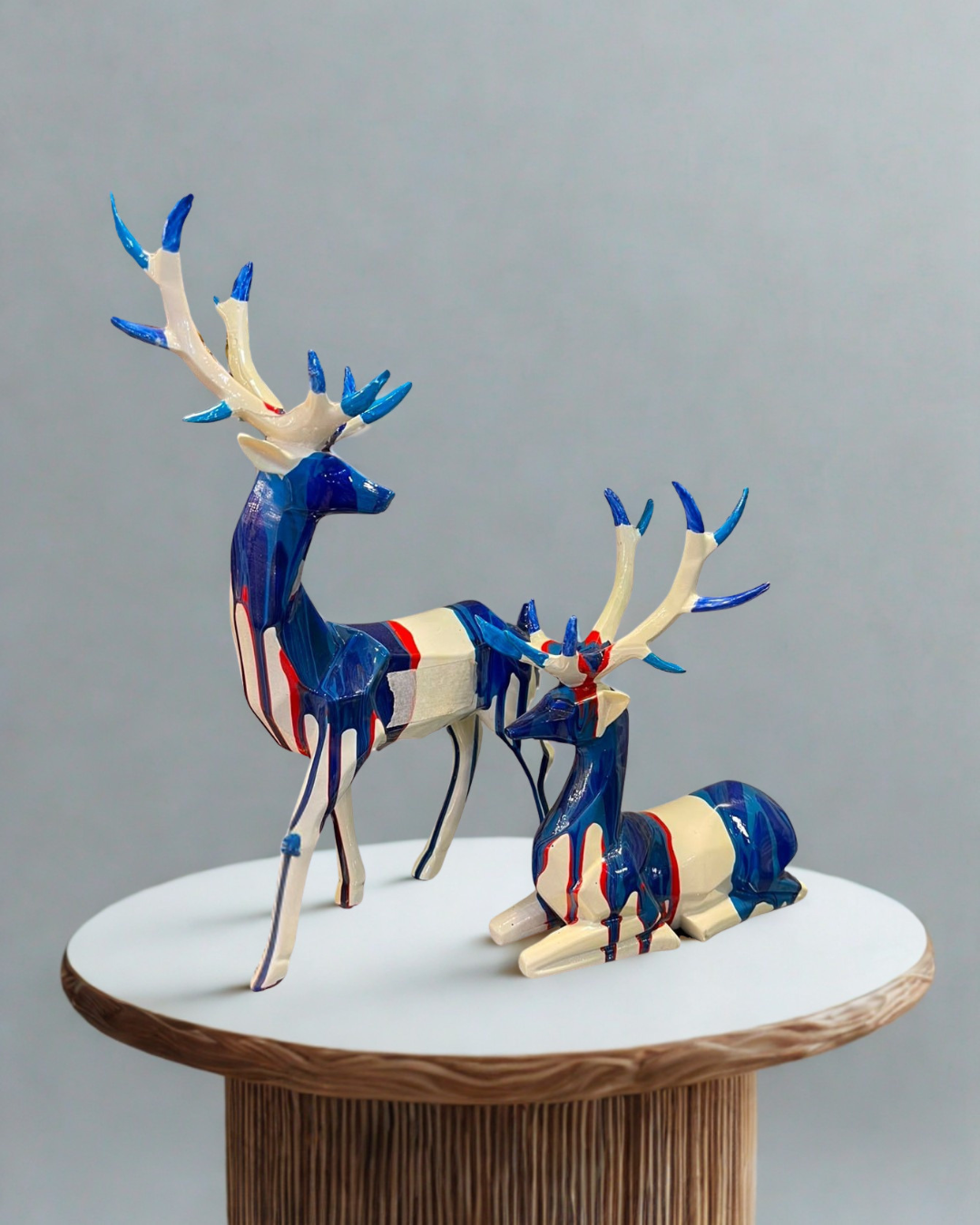 Modern Fluid Art Deer Statue Pair.